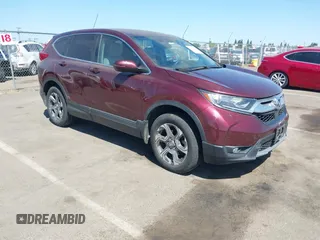 2018 Honda CR-V EX-L z VIN 2HKRW2H85JH698797, wystawiony jako IAAI lot #42300432 z przebiegiem 131 345 mil mil oraz . Historia ofert i sprzedaży dostępna na DreamBid. Obrazek 1.