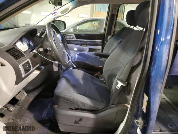 2010 Dodge Grand Caravan SXT with VIN 2D4RN5D14AR101531, listed as a Copart auction lot 42617595 with 238,350 mi miles and Salvage Title. Bid and sale history available at carsss.com. Image 7.
