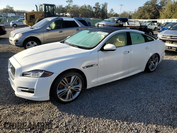 2016 Jaguar XJ with VIN SAJWA1CE4GMV91734, listed as a Copart auction lot 81005144 with 31,924 mi miles and Salvage Title. Bid and sale history available at DreamBid. Image 1.