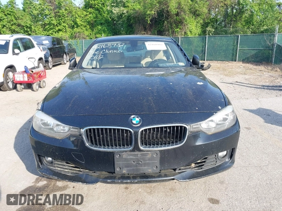 2014 BMW 3 Series 328i xDrive with VIN WBA3B5G56ENS06890, listed as a IAAI auction lot 42168982 with 133,664 mi miles. Bid and sale history available at carsss.com. Image 12.