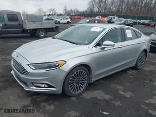 2018 Ford Fusion Titanium with VIN 3FA6P0D99JR139114, listed as a IAAI auction lot 41991248 with 142,324 mi miles. Bid and sale history available at carsss.com. Image 2.