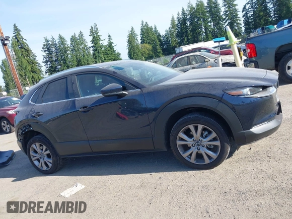 2023 Mazda CX-30 S Select with VIN 3MVDMBBM4PM558831, listed as a IAAI auction lot 42432750 with 12,468 mi miles and . Bid and sale history available at DreamBid. Image 14.