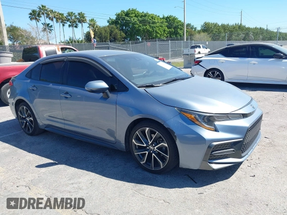 2021 Toyota Corolla SE with VIN JTDS4MCE1MJ063524, listed as a IAAI auction lot 41822622 with 50,882 mi miles. Bid and sale history available at carsss.com. Image 1.