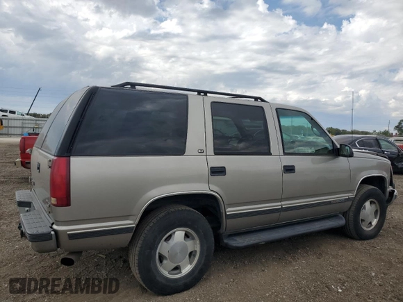 1999 GMC Yukon with VIN 1GKEK13R9XJ787877, listed as a Copart auction lot 72185044 with 191,710 mi miles and Salvage Title. Bid and sale history available at carsss.com. Image 3.
