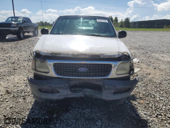 1997 Ford Expedition XLT with VIN 1FMEU17L2VLB74797, listed as a Copart auction lot 61377745 with 236,140 mi miles and Salvage title. Bid and sale history available at DreamBid. Image 5.