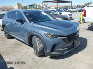 2023 Mazda CX-50 Meridian Edition with VIN 7MMVABXY1PN121398, listed as a IAAI auction lot 42640548 with 31,649 mi miles and . Bid and sale history available at DreamBid. Image 1.