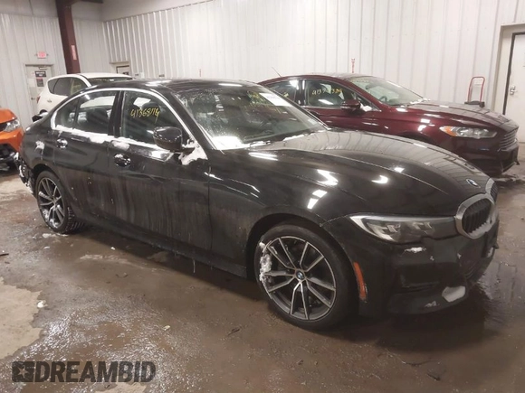 2019 BMW 3 Series 330i xDrive with VIN WBA5R7C56KAJ86102, listed as a IAAI auction lot 41368114 with 89,723 mi miles. Bid and sale history available at carsss.com. Image 1.