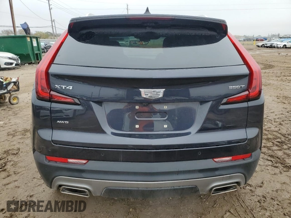 2022 Cadillac XT4 AWD Premium Luxury with VIN 1GYFZDR42NF147920, listed as a Copart auction lot 84058554 with 12,145 mi miles and Salvage Title. Bid and sale history available at carsss.com. Image 6.