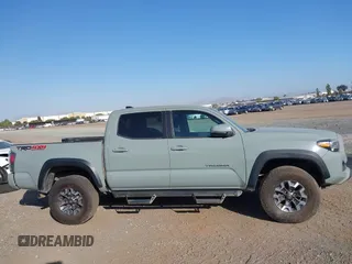 2022 Toyota Tacoma SR with VIN 3TMCZ5AN7NM501028, listed as a IAAI auction lot 42537868 with 42,186 mi miles and . Bid and sale history available at DreamBid. Image 13.