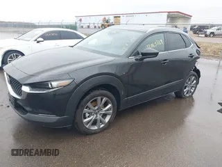 2025 Mazda CX-30 S Carbon Edition z VIN 3MVDMBCM9SM783429, wystawiony jako IAAI lot #42065729 z przebiegiem 4 940 mil mil oraz . Historia ofert i sprzedaży dostępna na DreamBid. Obrazek 17.