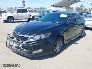 2012 Kia Optima LX with VIN 5XXGM4A71CG082636, listed as a IAAI auction lot 41862116 with 141,753 mi miles. Bid and sale history available at carsss.com. Image 2.