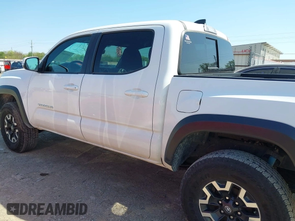 2023 Toyota Tacoma SR z VIN 3TYCZ5AN5PT151681, wystawiony jako IAAI lot #41936577 z przebiegiem 30 056 mil mil oraz . Historia ofert i sprzedaży dostępna na DreamBid. Obrazek 15.