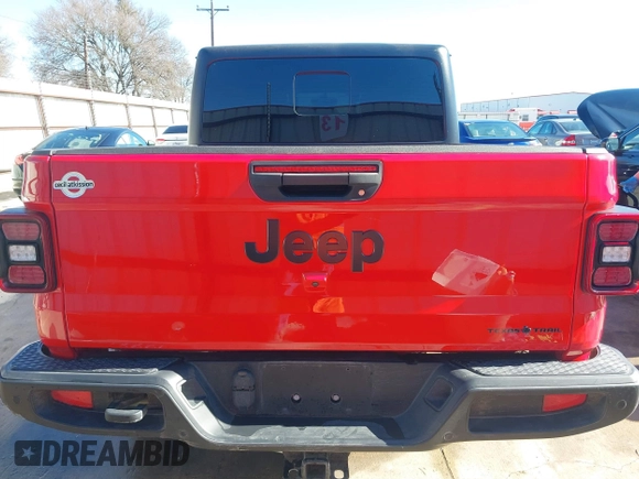 2021 Jeep Gladiator Freedom z VIN 1C6HJTAG7ML609661, wystawiony jako IAAI lot #41410756 z przebiegiem 44 636 mil mil oraz . Historia ofert i sprzedaży dostępna na DreamBid. Obrazek 16.
