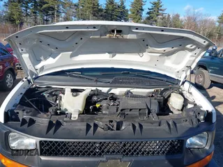 2014 Chevrolet Express Cargo Van with VIN 1GCWGGBA6E1122934, listed as a IAAI auction lot 40999693 with 194,565 mi miles. Bid and sale history available at carsss.com. Image 10.