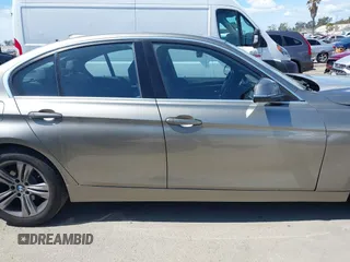 2018 BMW 3 Series 330i with VIN WBA8B9G58JNU98341, listed as a IAAI auction lot 41909777 with 85,396 mi miles and . Bid and sale history available at DreamBid. Image 14.