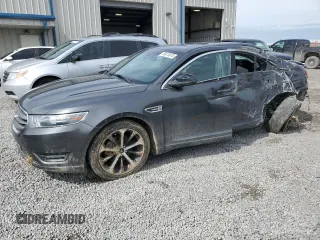 2015 Ford Taurus SEL z VIN 1FAHP2E89FG177287, wystawiony jako Copart lot #56074615 z przebiegiem 196 421 mil mil oraz Szkody całkowita. Historia ofert i sprzedaży dostępna na DreamBid. Obrazek 1.