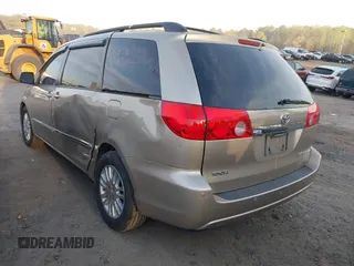 2007 Toyota Sienna XLE with VIN 5TDZK22C97S062721, listed as a IAAI auction lot 41900786 with 220,189 mi miles. Bid and sale history available at carsss.com. Image 3.