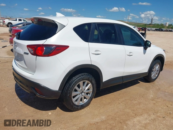 2016 Mazda CX-5 Touring z VIN JM3KE2CY0G0840918, wystawiony jako IAAI lot #42205529 z przebiegiem 74 515 mil mil oraz . Historia ofert i sprzedaży dostępna na DreamBid. Obrazek 4.