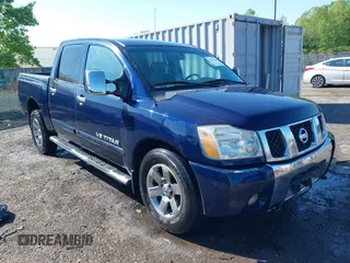 2007 Nissan Titan SE z VIN 1N6BA07B77N214250, wystawiony jako IAAI lot #42142029 z przebiegiem 184 575 mil mil oraz . Historia ofert i sprzedaży dostępna na DreamBid. Obrazek 1.