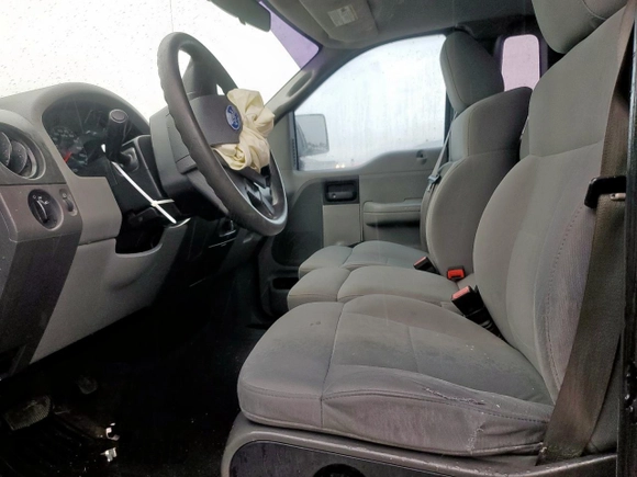 2007 Ford F-150 XL with VIN 1FTRF12217KC92122, listed as a Copart auction lot 60499615 with 110,510 mi miles and Salvage title. Bid and sale history available at DreamBid. Image 7.