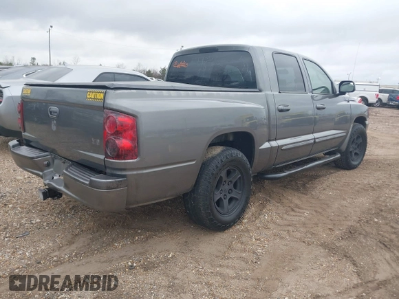 2005 Dodge Dakota SLT with VIN 1D7HE48N05S293699, listed as a IAAI auction lot 41541498 with 166,159 mi miles and . Bid and sale history available at carsss.com. Image 4.