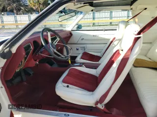 1975 Oldsmobile Cutlass z VIN 3J57T5M323248, wystawiony jako Copart lot #80526124 z przebiegiem 13 934 mil mil oraz Szkody całkowita. Historia ofert i sprzedaży dostępna na DreamBid. Obrazek 7.