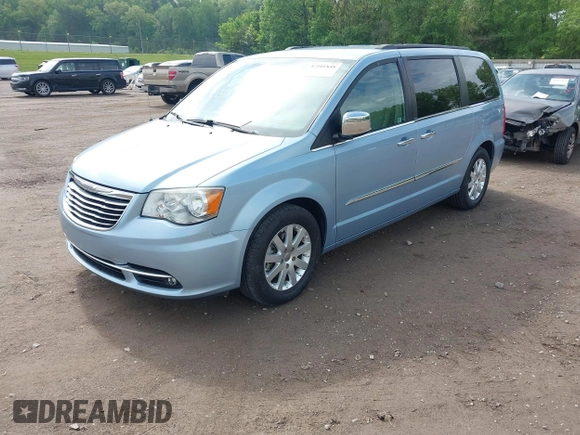 2012 Chrysler Town & Country Touring L with VIN 2C4RC1CG1CR393269, listed as a IAAI auction lot 42101848 with 144,881 mi miles and . Bid and sale history available at carsss.com. Image 2.