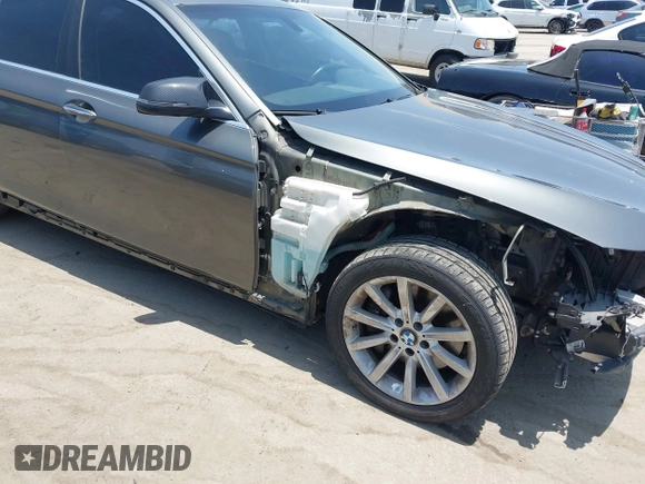 2014 BMW 5 Series 535i xDrive with VIN WBA5B3C57ED531072, listed as a IAAI auction lot 42574991 with 104,304 mi miles and . Bid and sale history available at DreamBid. Image 6.