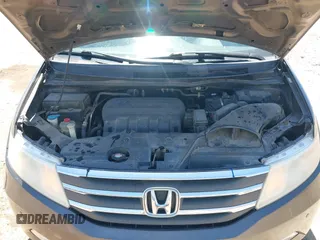 2012 Honda Odyssey Touring with VIN 5FNRL5H93CB109394, listed as a IAAI auction lot 42280018 with 190,412 mi miles and . Bid and sale history available at DreamBid. Image 10.