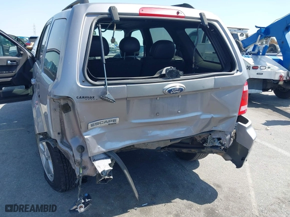2008 Ford Escape Limited with VIN 1FMCU04188KE20184, listed as a IAAI auction lot 41809075 with 158,116 mi miles. Bid and sale history available at carsss.com. Image 6.