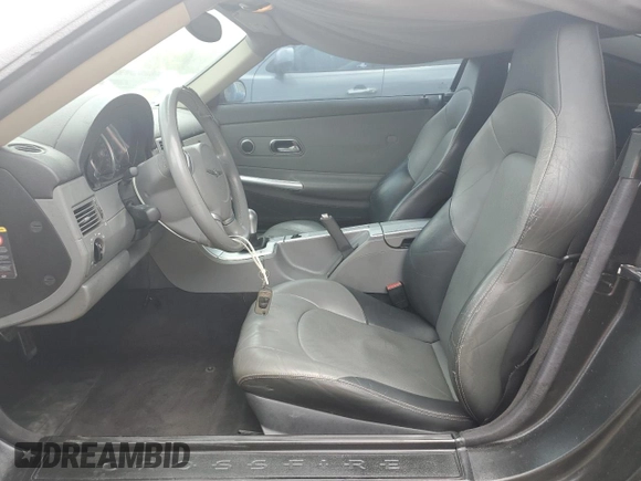 2004 Chrysler Crossfire z VIN 1C3AN69L84X014803, wystawiony jako Copart lot #56139015 z przebiegiem 102 523 mil mil oraz Szkoda całkowita • Salvage title. Historia ofert i sprzedaży dostępna na DreamBid. Obrazek 7.