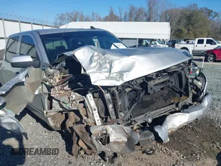 2016 Chevrolet Silverado 1500 LT with VIN 3GCUKREC0GG131034, listed as a IAAI auction lot 41289762 with 176,978 mi miles and . Bid and sale history available at DreamBid. Image 6.
