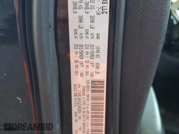 2018 Dodge Durango SXT z VIN 1C4RDJAG9JC483324, wystawiony jako Copart lot #61355725 z przebiegiem 111 175 mil mil oraz Szkoda całkowita • Salvage title. Historia ofert i sprzedaży dostępna na DreamBid. Obrazek 13.