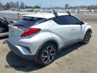 2018 Toyota C-HR XLE with VIN NMTKHMBX8JR036857, listed as a IAAI auction lot 42667018 with 63,058 mi miles and . Bid and sale history available at DreamBid. Image 4.