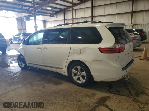 2016 Toyota Sienna LE AAS with VIN 5TDKK3DC6GS764404, listed as a Copart auction lot 63380615 with 123,221 mi miles and Salvage title. Bid and sale history available at DreamBid. Image 2.