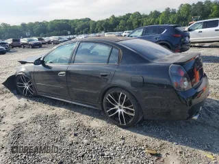 2002 Nissan Altima SE z VIN 1N4BL11D52C257427, wystawiony jako Copart lot #56577585 z przebiegiem 364 788 mil mil oraz Szkoda całkowita • Salvage title. Historia ofert i sprzedaży dostępna na DreamBid. Obrazek 2.