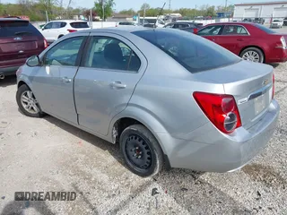 2015 Chevrolet Sonic LT with VIN 1G1JC5SH6F4121976, listed as a IAAI auction lot 42143052 with 63,885 mi miles and . Bid and sale history available at DreamBid. Image 3.