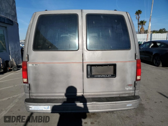 1992 Chevrolet Astro with VIN 1GNDM19Z3NB219051, listed as a Copart auction lot 41997675 with 242,745 mi miles and Salvage Title. Bid and sale history available at carsss.com. Image 6.
