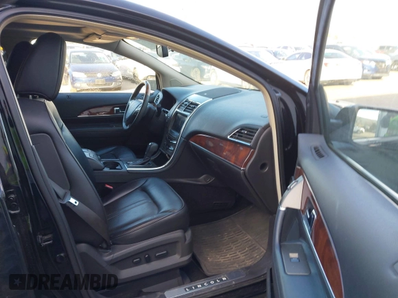 2012 Lincoln MKX with VIN 2LMDJ6JK0CBL02487, listed as a IAAI auction lot 41191697 with 164,653 mi miles. Bid and sale history available at carsss.com. Image 5.