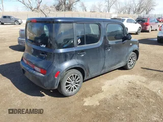 2012 Nissan Cube 1.8 S with VIN JN8AZ2KR4CT255579, listed as a IAAI auction lot 41617628 with 154,553 mi miles. Bid and sale history available at carsss.com. Image 4.