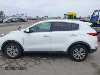 2018 Kia Sportage LX with VIN KNDPM3AC1J7413227, listed as a IAAI auction lot 42188566 with 77,897 mi miles and . Bid and sale history available at carsss.com. Image 14.