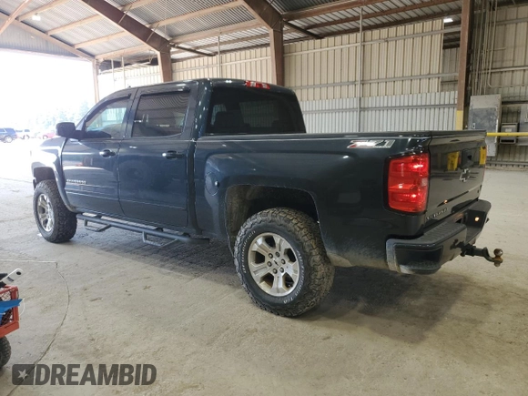 2017 Chevrolet Silverado 1500 LT with VIN 3GCUKREC6HG299892, listed as a Copart auction lot 51899955 with 161,625 mi miles and Salvage Title. Bid and sale history available at DreamBid. Image 2.