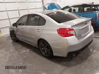 2016 Subaru WRX Premium with VIN JF1VA1E64G8811369, listed as a IAAI auction lot 41243335 with 129,319 mi miles. Bid and sale history available at carsss.com. Image 3.
