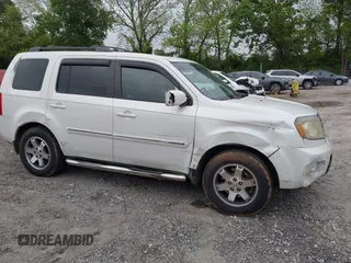 2011 Honda Pilot Touring z VIN 5FNYF4H9XBB053966, wystawiony jako IAAI lot #42148528 z przebiegiem 191 939 mil mil oraz . Historia ofert i sprzedaży dostępna na DreamBid. Obrazek 6.