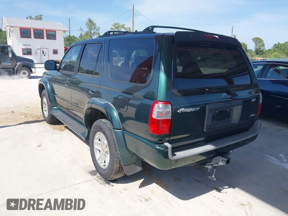 2000 Toyota 4Runner SR5 with VIN JT3GN86R9Y0153027, listed as a IAAI auction lot 42068029 with 188,171 mi miles and . Bid and sale history available at DreamBid. Image 3.