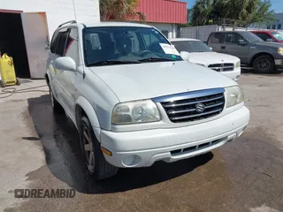 2003 Suzuki XL-7 Touring with VIN JS3TX92V934104149, listed as a IAAI auction lot 41911536 with 140,199 mi miles. Bid and sale history available at carsss.com. Image 1.