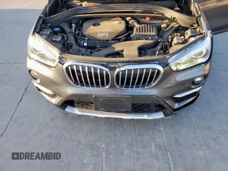2019 BMW X1 xDrive28i with VIN WBXHT3C51K3H34687, listed as a Copart auction lot 50135845 with 59,549 mi miles and Salvage Title. Bid and sale history available at carsss.com. Image 13.