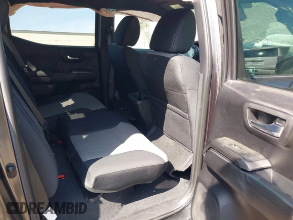 2021 Toyota Tacoma SR5 z VIN 3TMDZ5BN8MM117163, wystawiony jako IAAI lot #42070540 z przebiegiem 12 790 mil mil oraz . Historia ofert i sprzedaży dostępna na DreamBid. Obrazek 8.