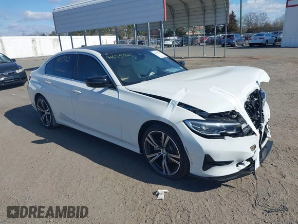 2021 BMW 3 Series 330i with VIN 3MW5R1J08M8B89327, listed as a IAAI auction lot 41655721 with 22,064 mi miles. Bid and sale history available at carsss.com. Image 1.