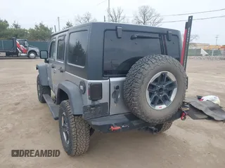 2015 Jeep Wrangler Unlimited Rubicon with VIN 1C4BJWFG1FL546018, listed as a IAAI auction lot 42060045 with 107,249 mi miles and . Bid and sale history available at DreamBid. Image 3.